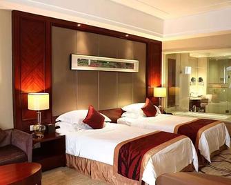 Ramada Plaza by Wyndham Shaoguan City Centre - Shaoguan - Camera da letto