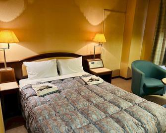 Kanonji Grand Hotel - Kotohira - Slaapkamer