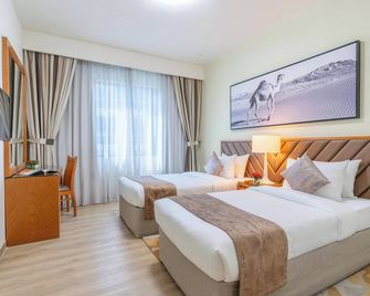 Golden Sands 10 Hotel Apartments - Dubai - Schlafzimmer