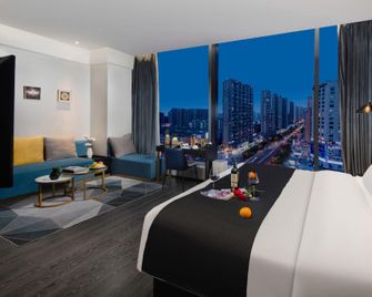 Millennial Oriental Hotel (Taiyuan South Railway Station Jinyang Street Branch) - Taiyuan - Habitación