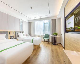 GreenTree Inn Taiyuan East Binhe Road Xiaodian High speed mouth Express Hotel - Taiyuan - Schlafzimmer