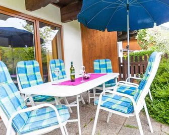 Fully equipped holiday home with terrace, garden & barbeque | Mountain view | Pets allowed - Bruck an der Großglocknerstraße - Innenhof