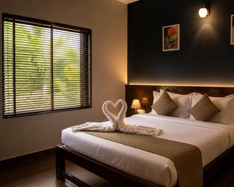 Prakruthi Retreat - Belgaum - Bedroom