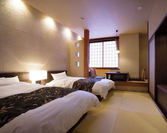 Shogawa Onsen Yumetsuzuri - Tonami - Schlafzimmer