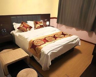 Dalian Yisongting Hotel - Dalian - Habitación