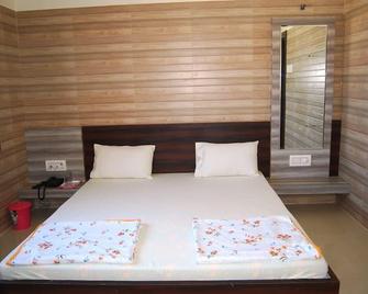 Hotel Madhusudan - Dwārka - Habitación