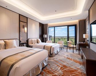 Yancheng Gangbo Peninsula Hotel - Yancheng - Bedroom