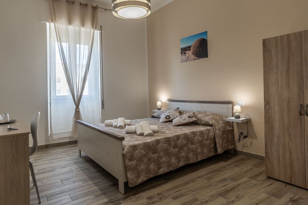 Boss Guest House - אלגרו - חדר שינה