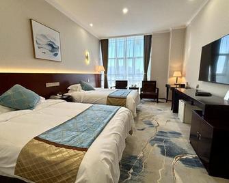 Sheng Shi International Hotel - Baoding - Schlafzimmer