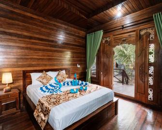 D and B Bungalow's by DeWizZ Management - Nusa Penida - Schlafzimmer