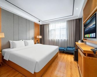 Zhengzhou Youna Hotel Huaihe Road - Zhengzhou - Bedroom
