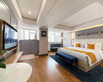 Shanshui S Hotel Dalian Railway Station City Government - Dalian - Bedroom