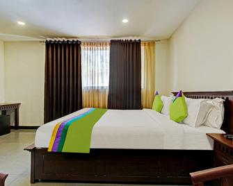 Treebo Trend Prince - Kottayam - Bedroom