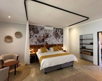 Kabakwe Guest Lodge - Victoria Falls - Bedroom