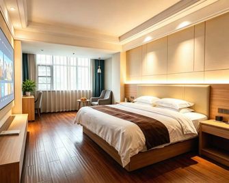 Shengjing Yijia Hotel ( Xiangyang New Wuzhong Wuyue Plaza Branch) - Xiangfan - Slaapkamer