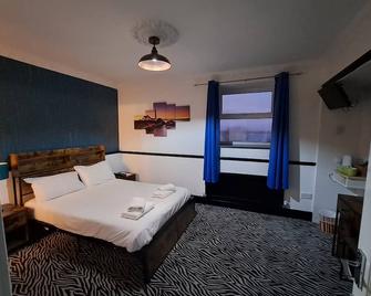 Boathouse Hotel - הוליהד - חדר שינה