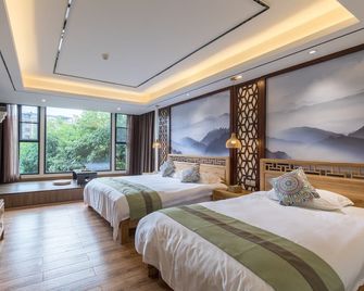 Riverside Inn Guilin Central - Guilin - Camera da letto