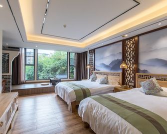 Riverside Inn Guilin Central - גילין - חדר שינה