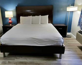 Lamar Inn and Suites - Barnesville - Bedroom