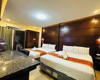 Jo Carter's Hotel and Suites Angeles City - Angeles City - Habitación