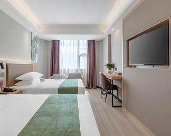 Green Tree Inn Yunnan Kunming Tongde Plaza Wanhong Road - Kunming - Bedroom