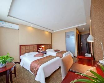 Fengyuan Hotel - Ляншань - Спальня