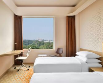 페어필드 바이 메리어트 첸나이 마힌드라 월드시티 - 신가페르말코일 - 침실