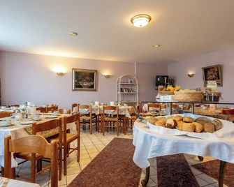 enjoyHotel garni Korntal Stuttgart b&b Parkplatz Sprinter Penny eTank - Korntal-Münchingen - Restaurante