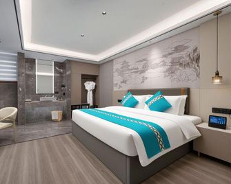 Wenshan Fengbang Garden Hotel (Qidu Ancient Town Branch) - Wenshan - Bedroom