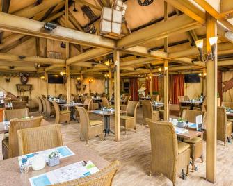 Cosy bungalow with dishwasher in the middle of De Maasduinen - Arcen - Restaurant