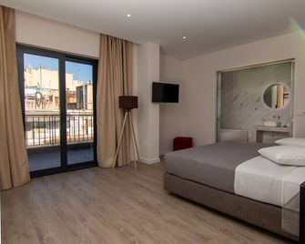 Dunlin Hotel - Atenas - Quarto