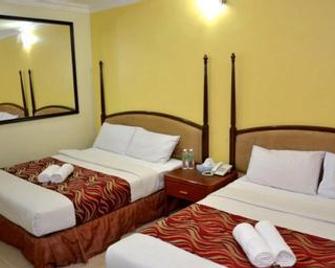 OYO 424 Kk Inn Hotel - Ampang - Спальня