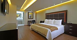 Quinta Dorada Hotel & Suites - Saltillo - Schlafzimmer