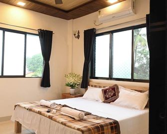 Magadha Mountain View Homestay - Alibag - Slaapkamer
