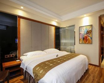Wanhao Business Hotel - Dandong - Camera da letto