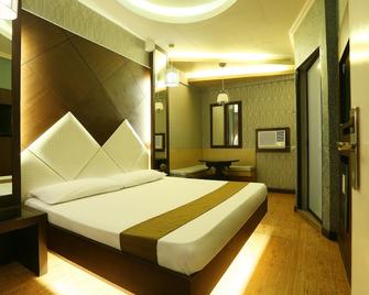 Hotel Ava Gil Puyat - מנילה - חדר שינה
