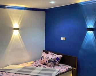 Adomi Hotel - Atimpoku - Bedroom
