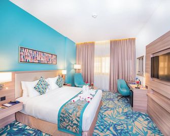 فندق مينا بلازا البرشاء - دبي - غرفة نوم