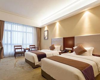 Zhangzhou Yuyuan Hotel - Zhangzhou - Bedroom