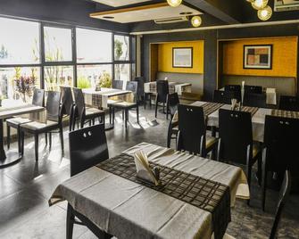 Oyo 767 Hotel Orion - Alto Porvorim - Restaurace