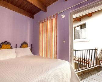 Quetzalroo Boutique Hostel - Guatemala - Makuuhuone