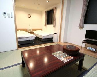 Business Hotel Sugi - Kirishima - Slaapkamer