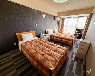 Kokumin Shukusha Noro Kogen Lodge - Kure - Bedroom