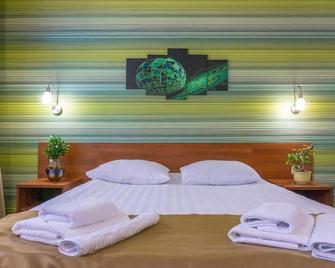 Hotel Zagreb - Saratov - Slaapkamer
