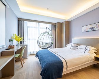 Yihe Boutique Hotel Apartments - Nankín - Habitación