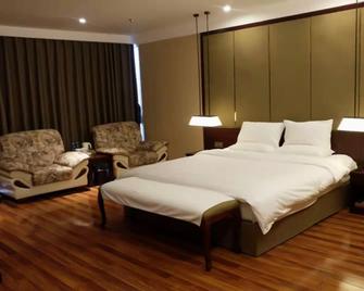 Starway Hotel Hengshui Jinshan International hotel - Hengshui - Спальня