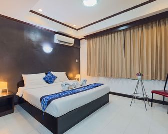 Grand Orchid Inn Patong beach - Patong - Bedroom