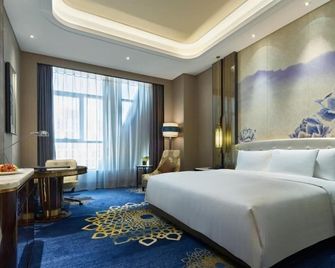 Wanda Vista Hotel Urumqi - Ürümqi - Bedroom
