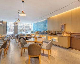 Home Inn Exhibition & Convention Centre Hanshui Road - Harbin - Restaurante