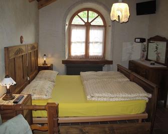 Agriturismo Alpenvidehof - Coredo - Camera da letto